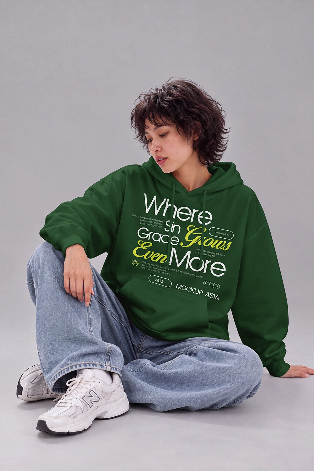 Realistic white sweatshirt mockup on seated female model