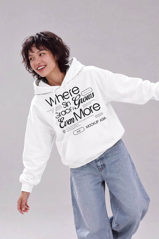 White hoodie mockup featuring female model in dynamic standing pose