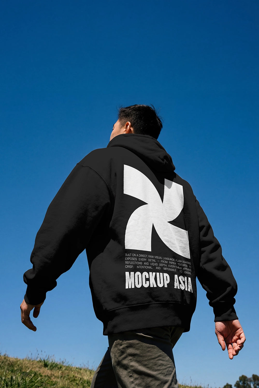 realistic hoodie mockup worn from behind with large back print in motion pose