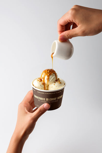Dessert mockup with ice cream cup and caramel topping action shot minimal background
