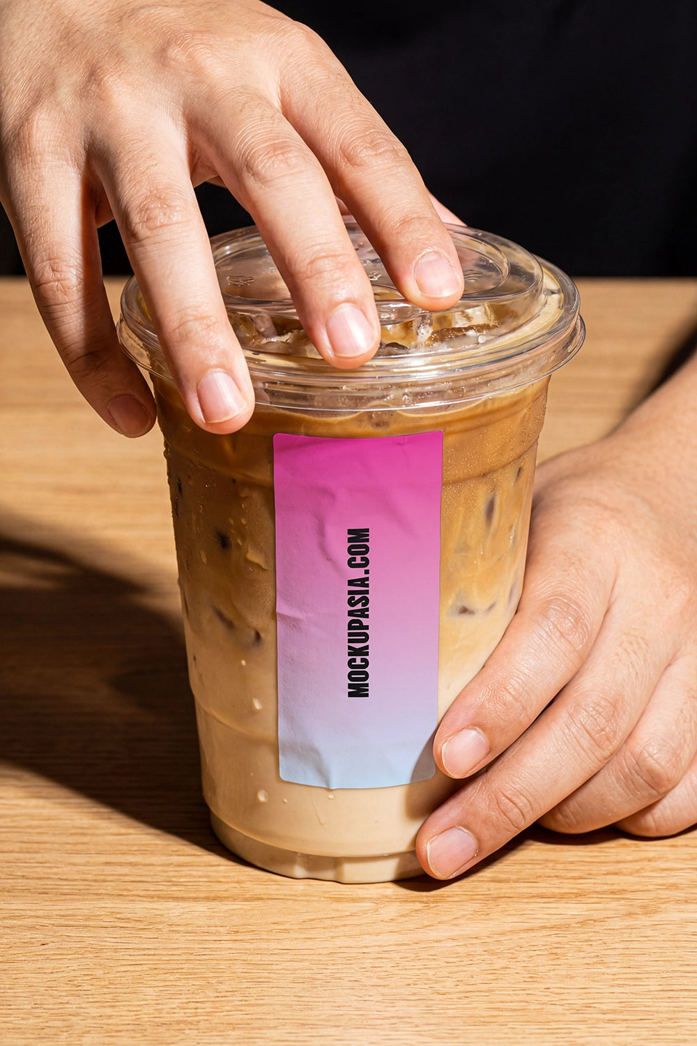 beverage cup mockup with sticker label and realistic condensation for cafe branding
