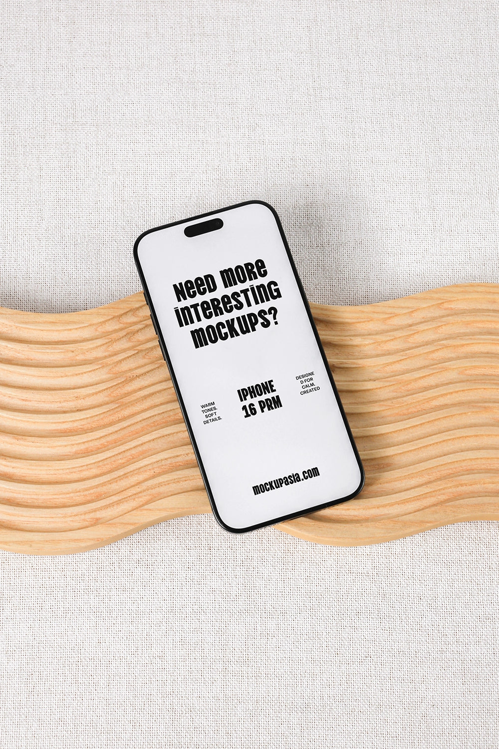 smartphone mockup on wooden surface with fabric background and minimal design