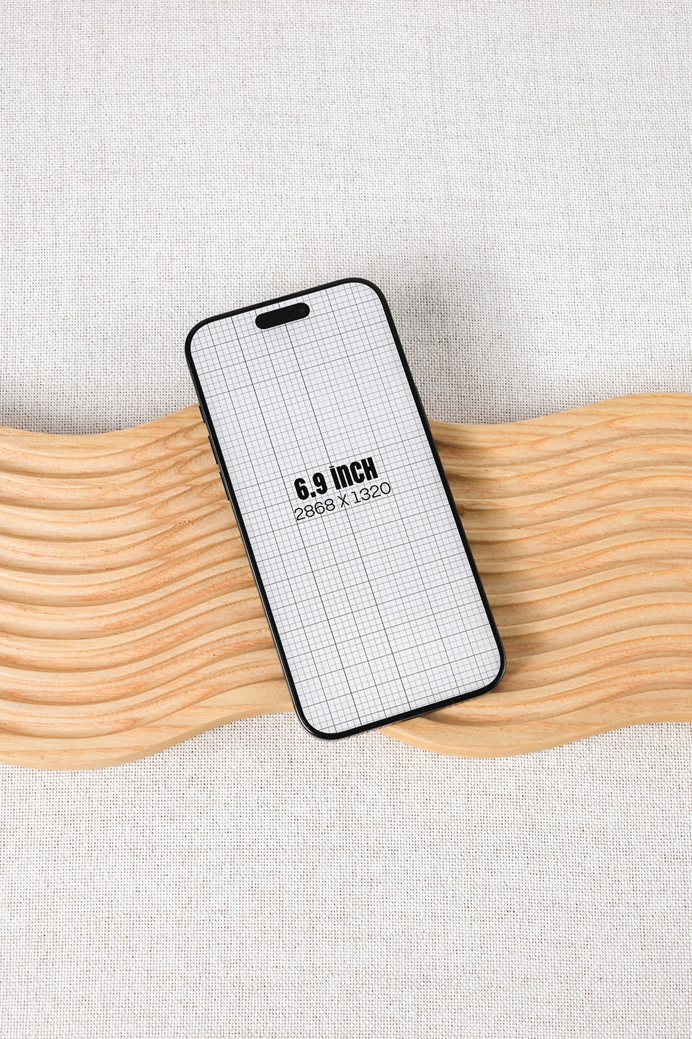 mobile phone mockup with modern layout on textured fabric and wood combination