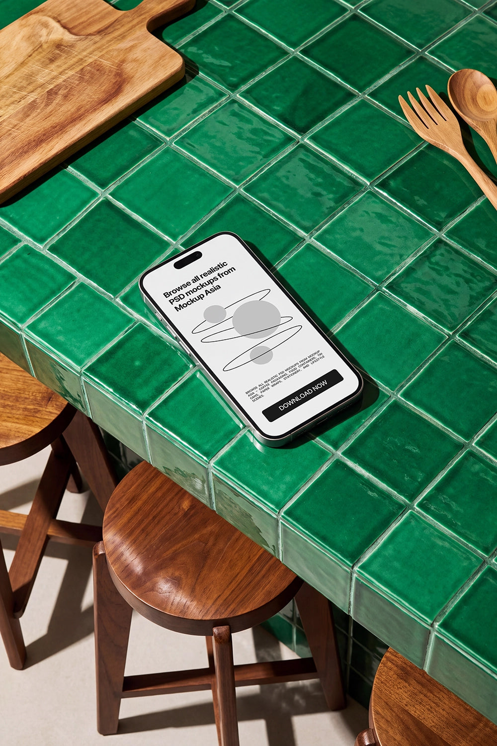 iPhone screen mockup on handcrafted green ceramic tiles