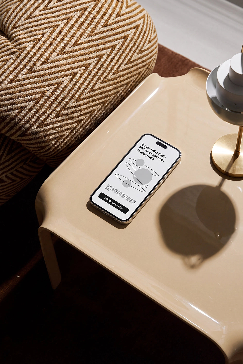 Realistic phone mockup on a sculptural table with ambient lighting