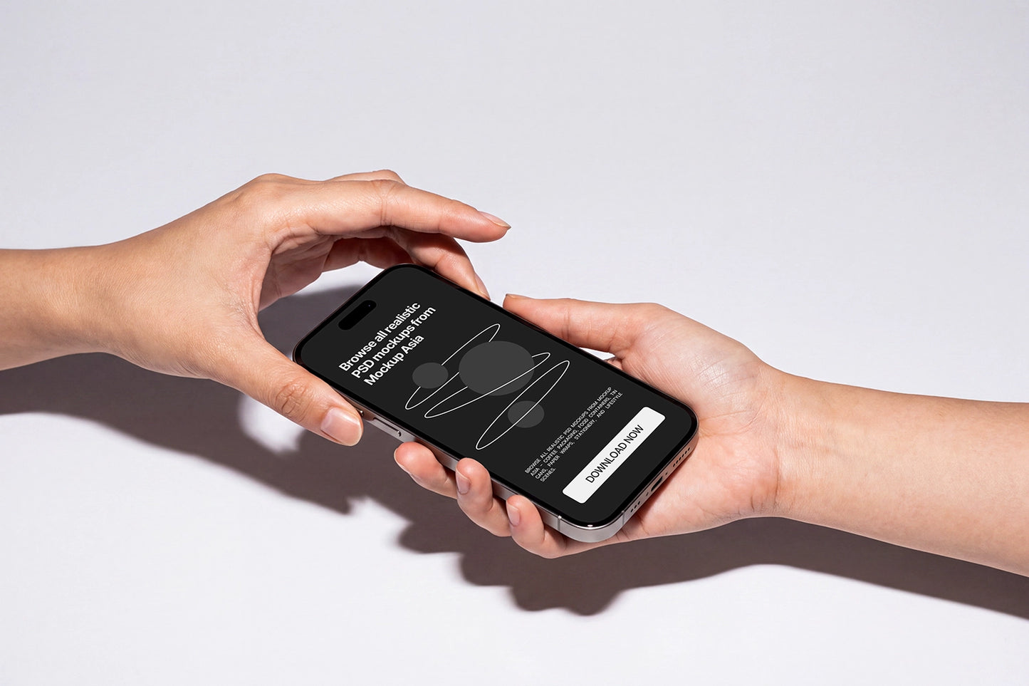 Hand holding iPhone PSD mockup with editable screen design