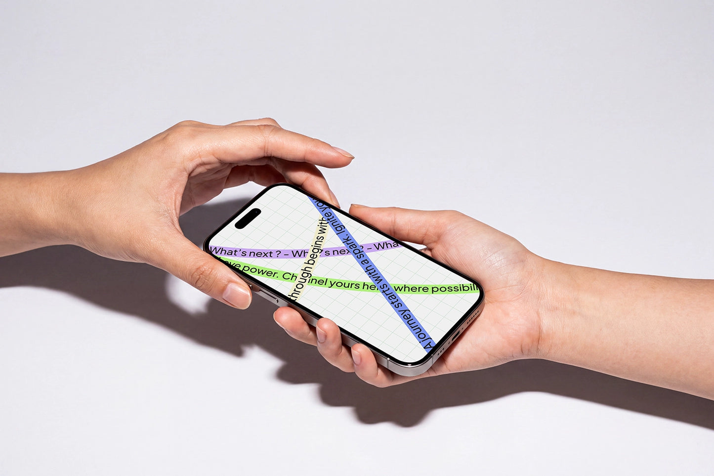 Realistic iPhone mockup held naturally between two hands