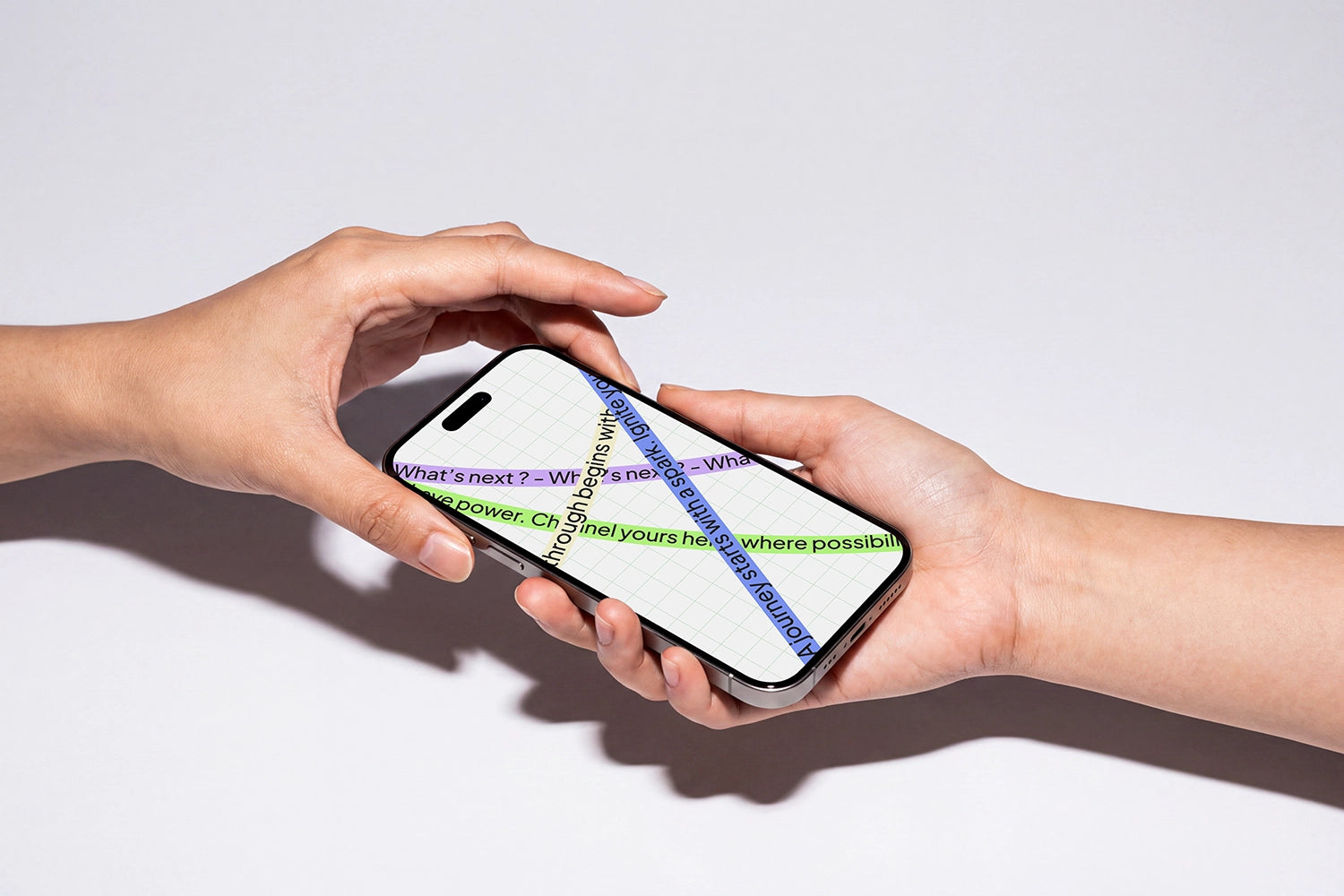 Realistic iPhone mockup held naturally between two hands