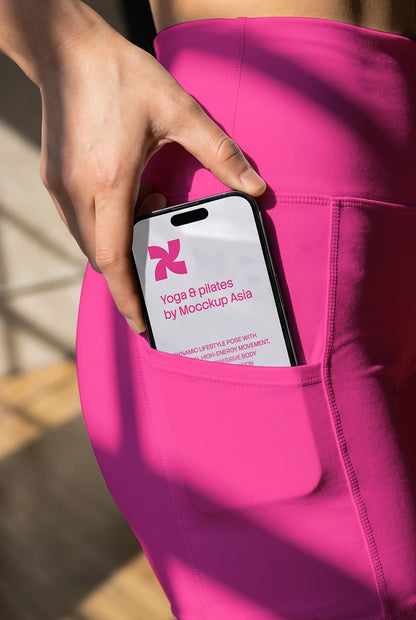 Fitness mobile UI mockup with iPhone placed naturally in athletic wear pocket