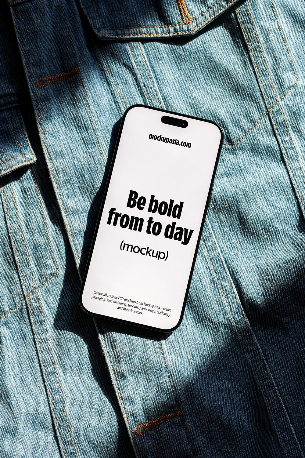 iphone mockup on denim jacket with sunlight shadow, fashion lifestyle app presentation