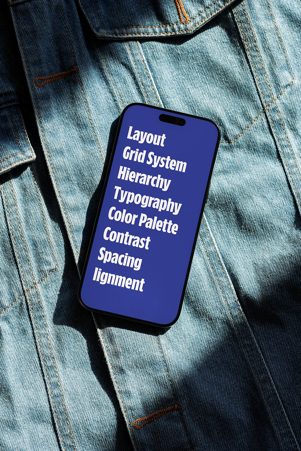 smartphone mockup on jeans fabric with natural light, modern and creative UI display