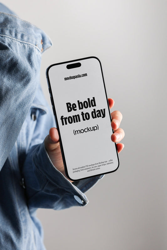 iphone mockup held in hand with denim jacket, fashion lifestyle app presentation