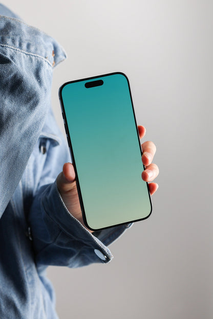 iphone screen mockup held by hand with jeans jacket, clean and stylish presentation
