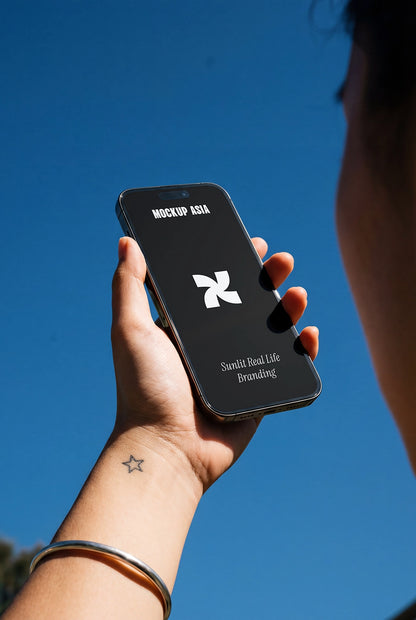 realistic smartphone mockup in hand outdoor with clean sky and soft shadow lighting
