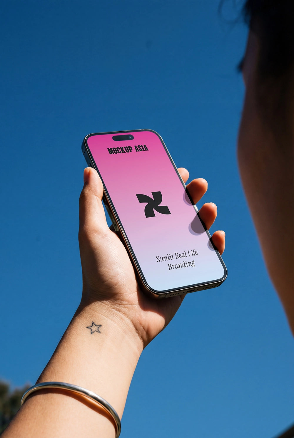 minimal phone mockup with hand holding device against sky branding presentation psd