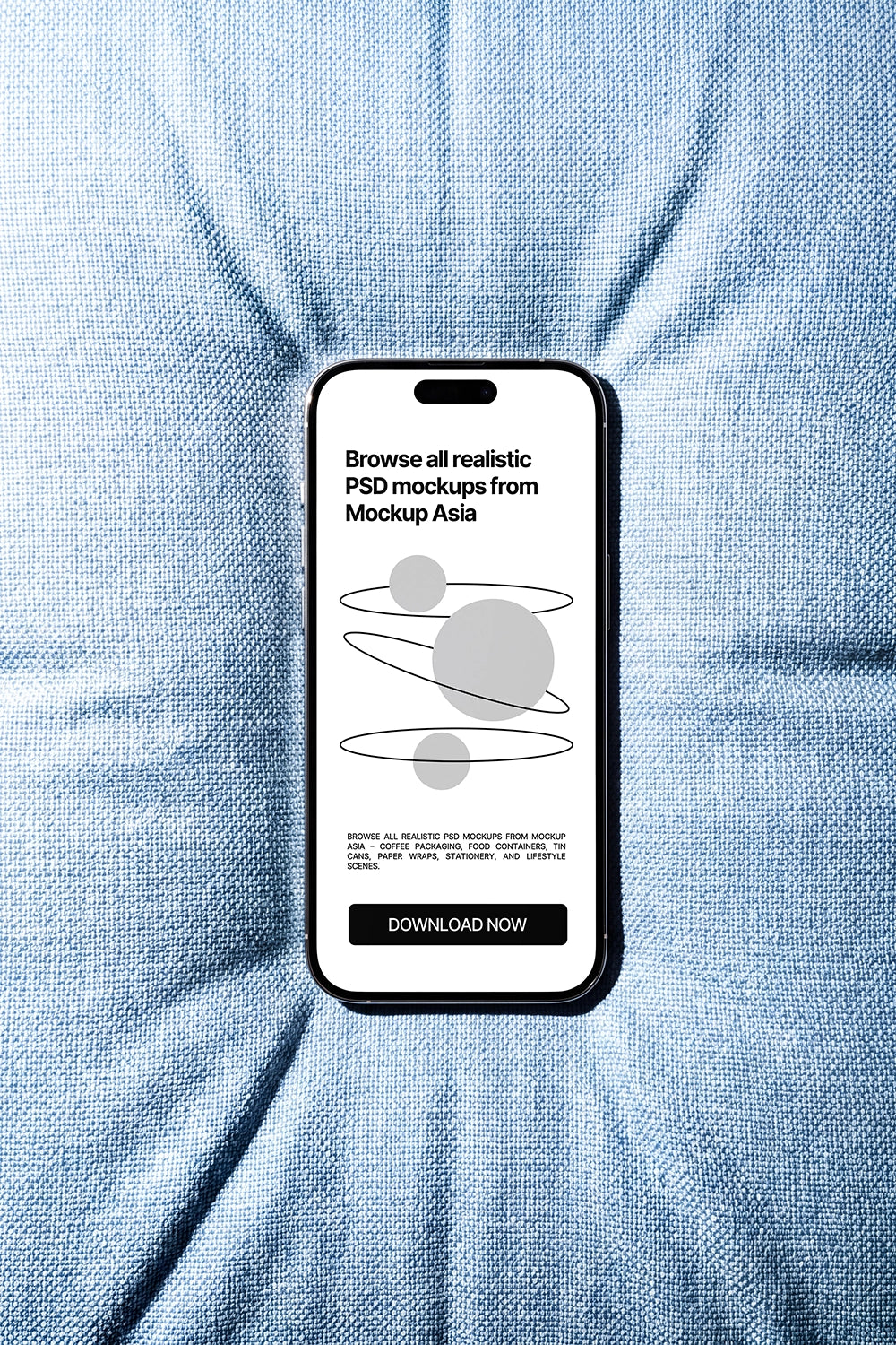 Modern mobile UI mockup on folded blue fabric surface