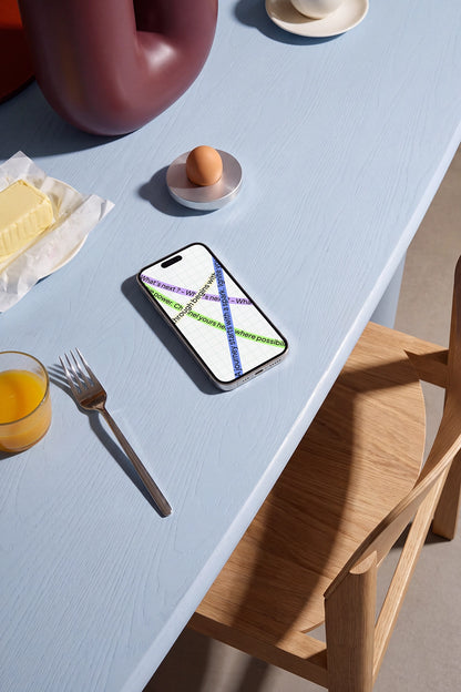 iPhone screen mockup with egg, butter, juice, and long natural shadows