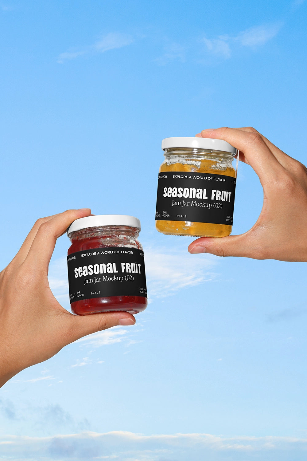 Jam jar mockup in hands with red and yellow fruit jars and clean sky backdrop