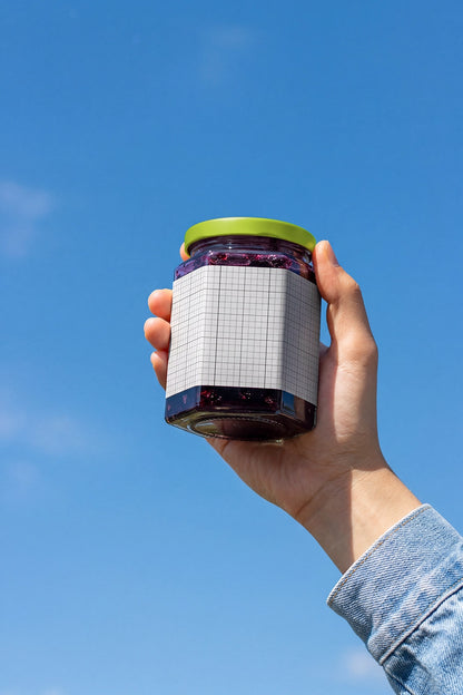 Food jar mockup PSD with realistic outdoor lifestyle presentation