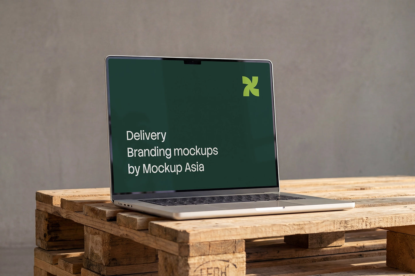 MacBook Pro 16-inch mockup on stacked wooden pallets