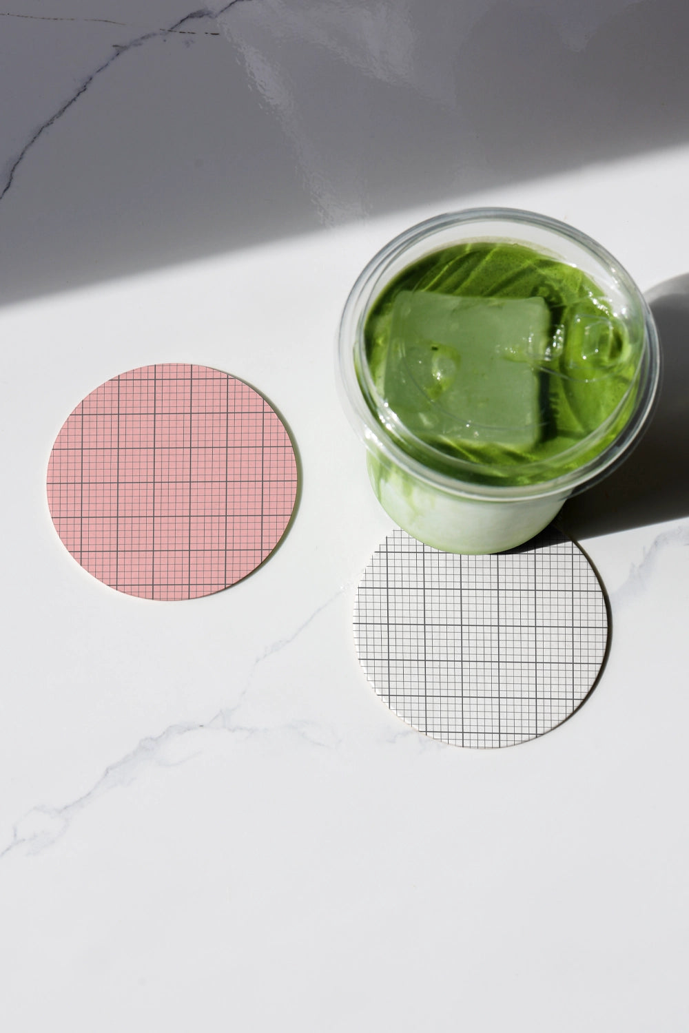 matcha packaging mockup with glass jar drink and label coasters, modern minimal aesthetic