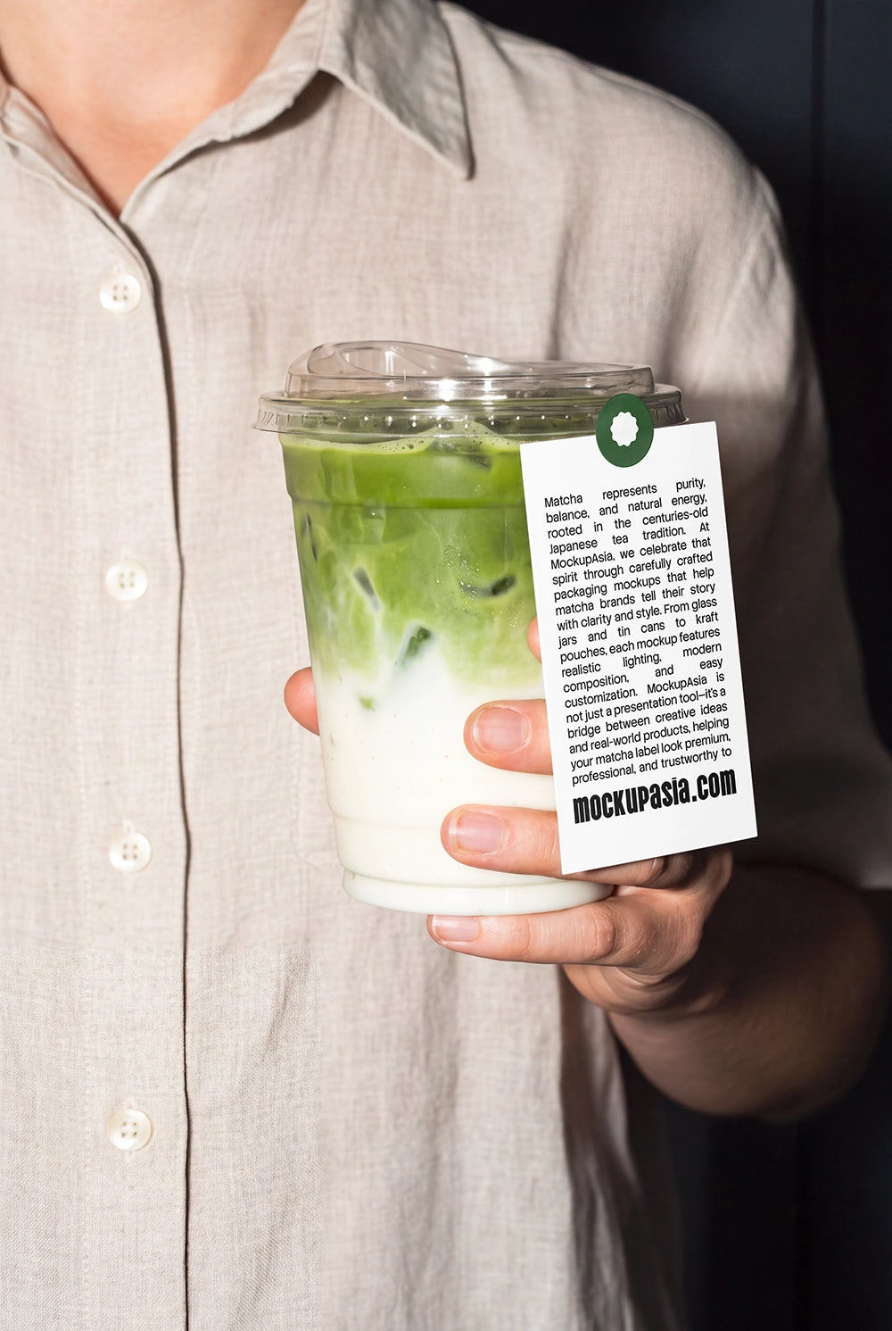 Realistic matcha latte cup mockup held in hand