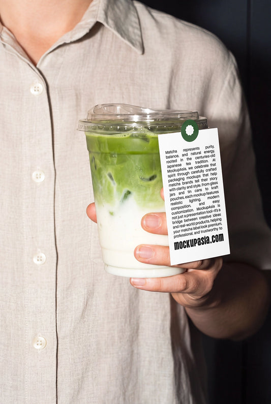 Realistic matcha latte cup mockup held in hand