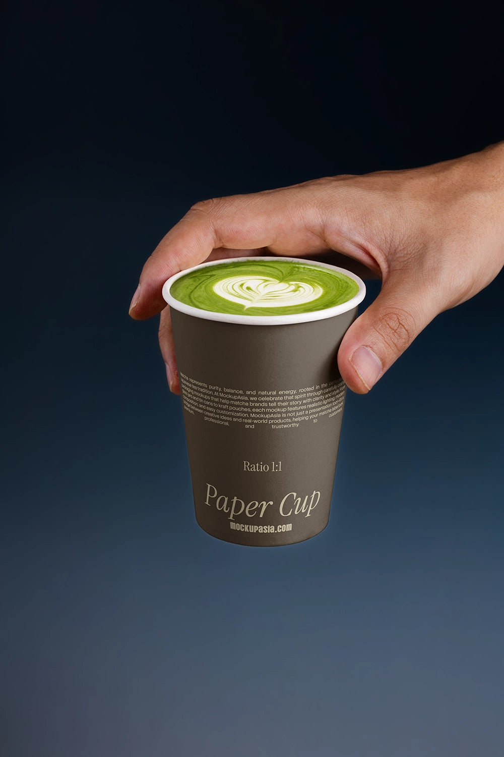 paper cup beverage mockup with matcha latte held by hand, modern cafe presentation