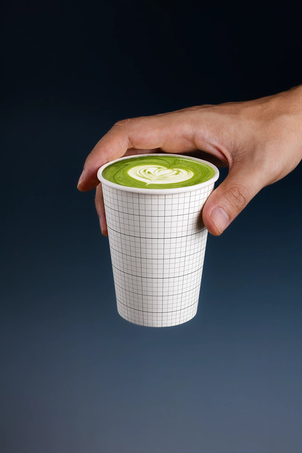 matcha drink mockup in paper cup with latte art, minimal and professional product display