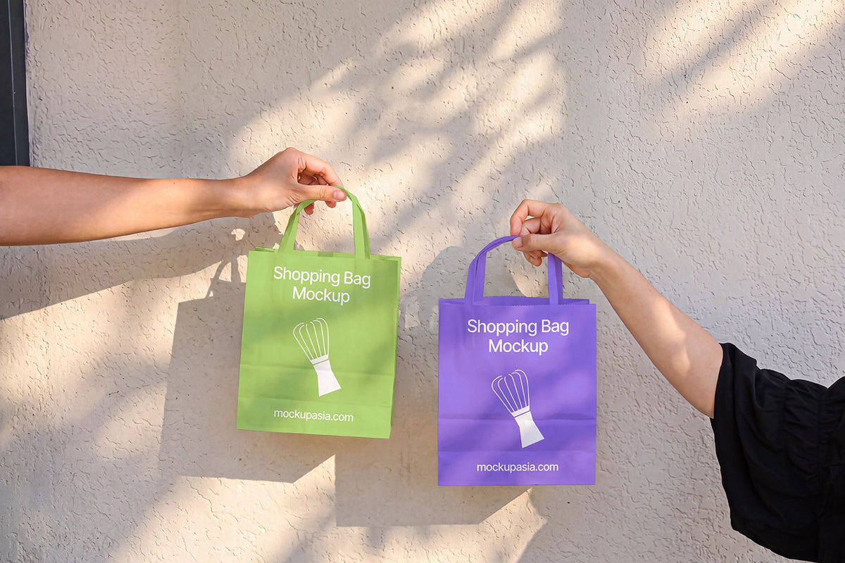 Two paper bag mockups green and purple color variation branding