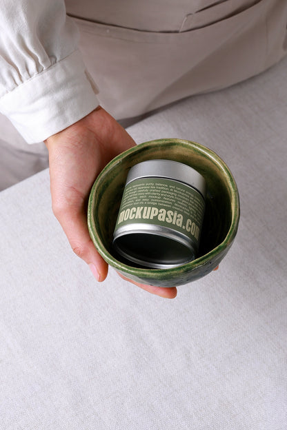 Metal tea tin packaging mockup with curved label design
