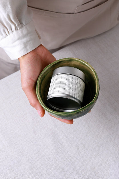 Premium Japanese tea tin mockup with natural ceramic styling