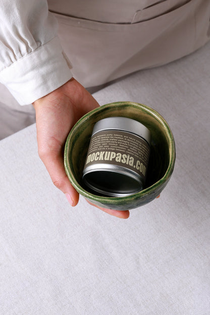 Matcha packaging PSD mockup featuring a realistic cylindrical tin