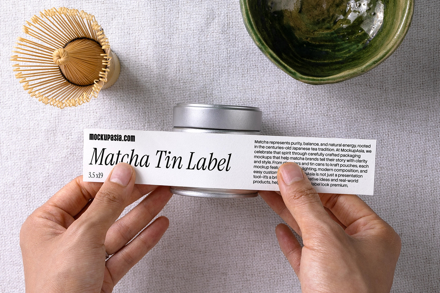 matcha tin label mockup held in hands with container, minimal branding presentation