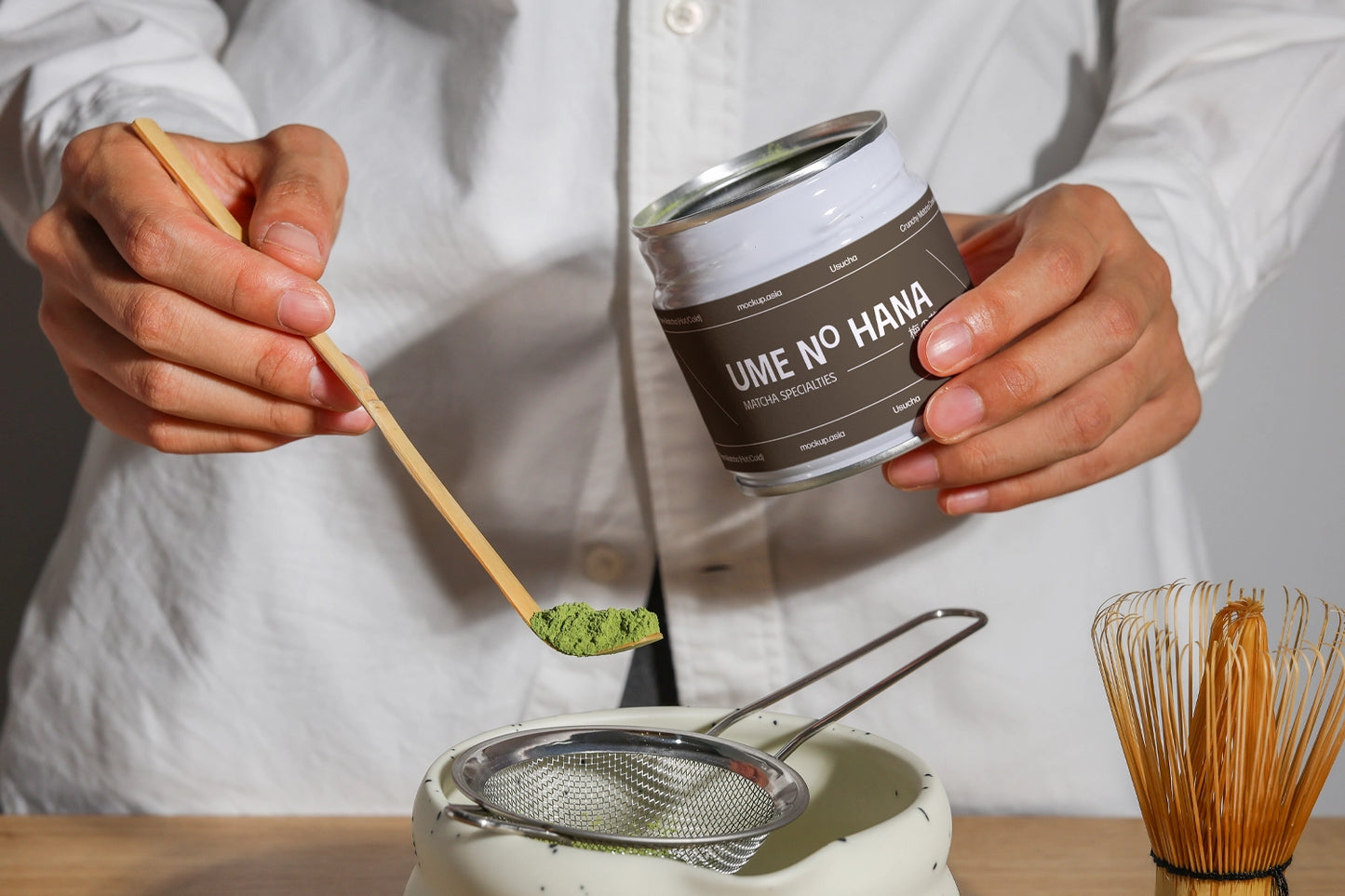 green tea matcha jar mockup with powder scoop and sifter, modern branding presentation