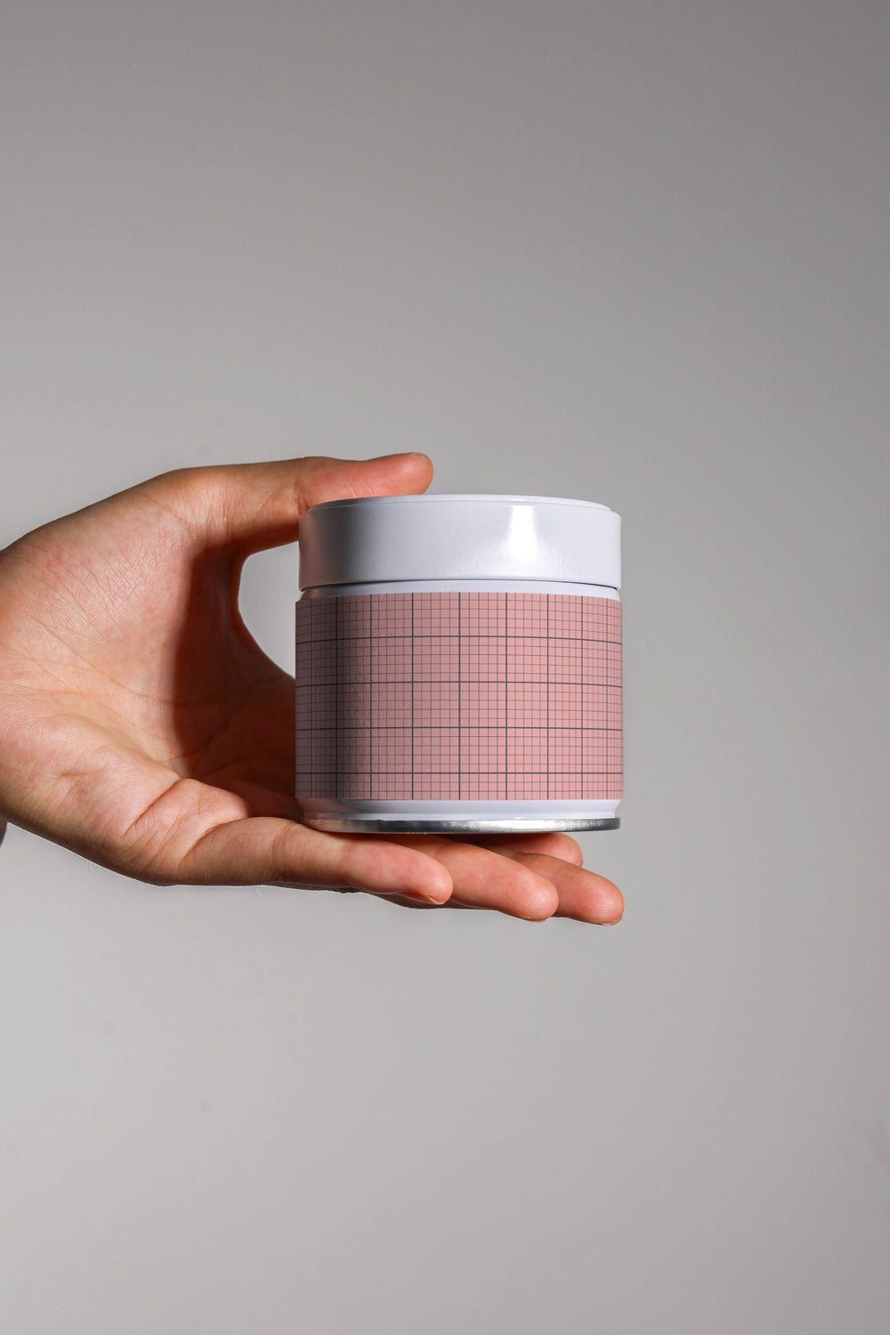 matcha packaging mockup jar with label design in hand, minimal lifestyle product template