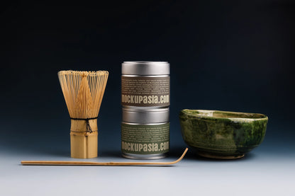 matcha packaging tin mockup set with tea tools, minimal and dramatic lighting scene