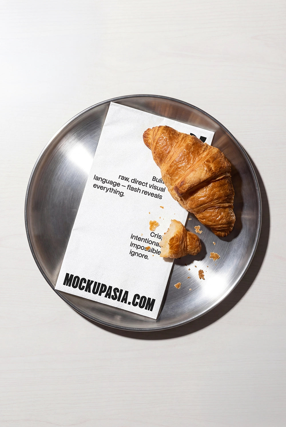 coffee menu mockup with croissant on metal tray high contrast flash lighting