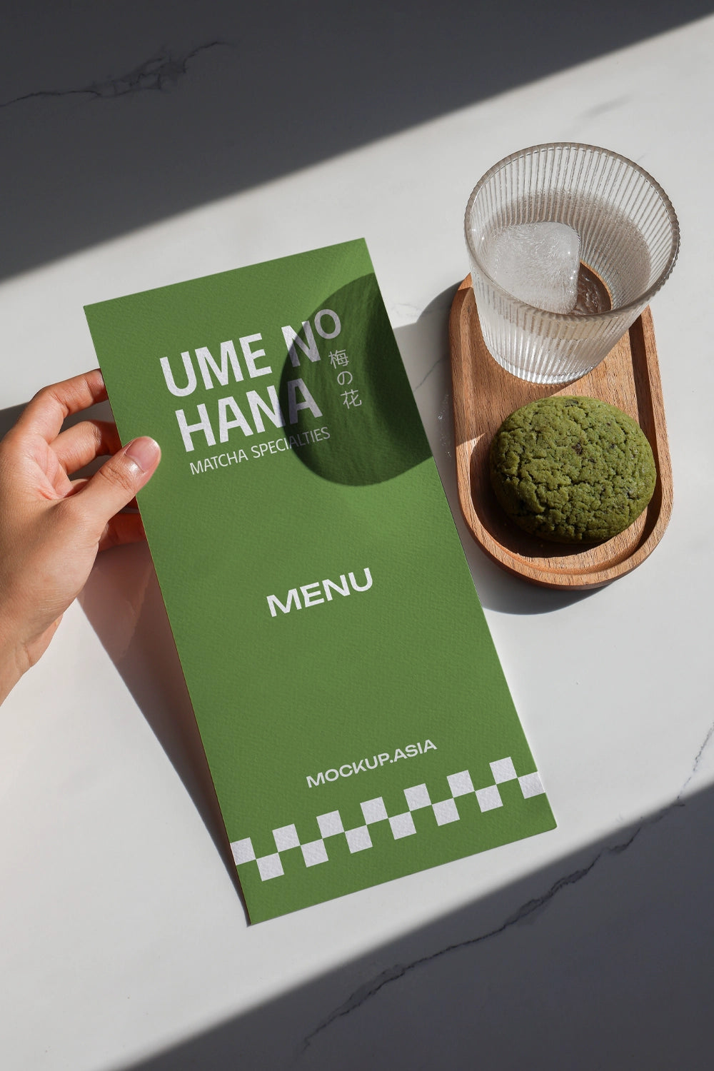 matcha cafe menu mockup with drink and cookie, clean flat lay on marble background