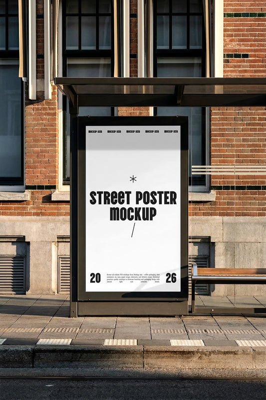 street poster mockup at bus stop shelter with brick building background and natural sunlight