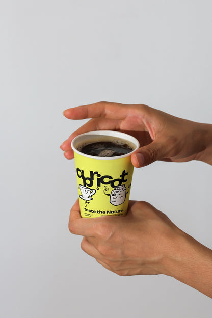 takeaway coffee cup mockup in hands with hot black coffee, clean branding presentation