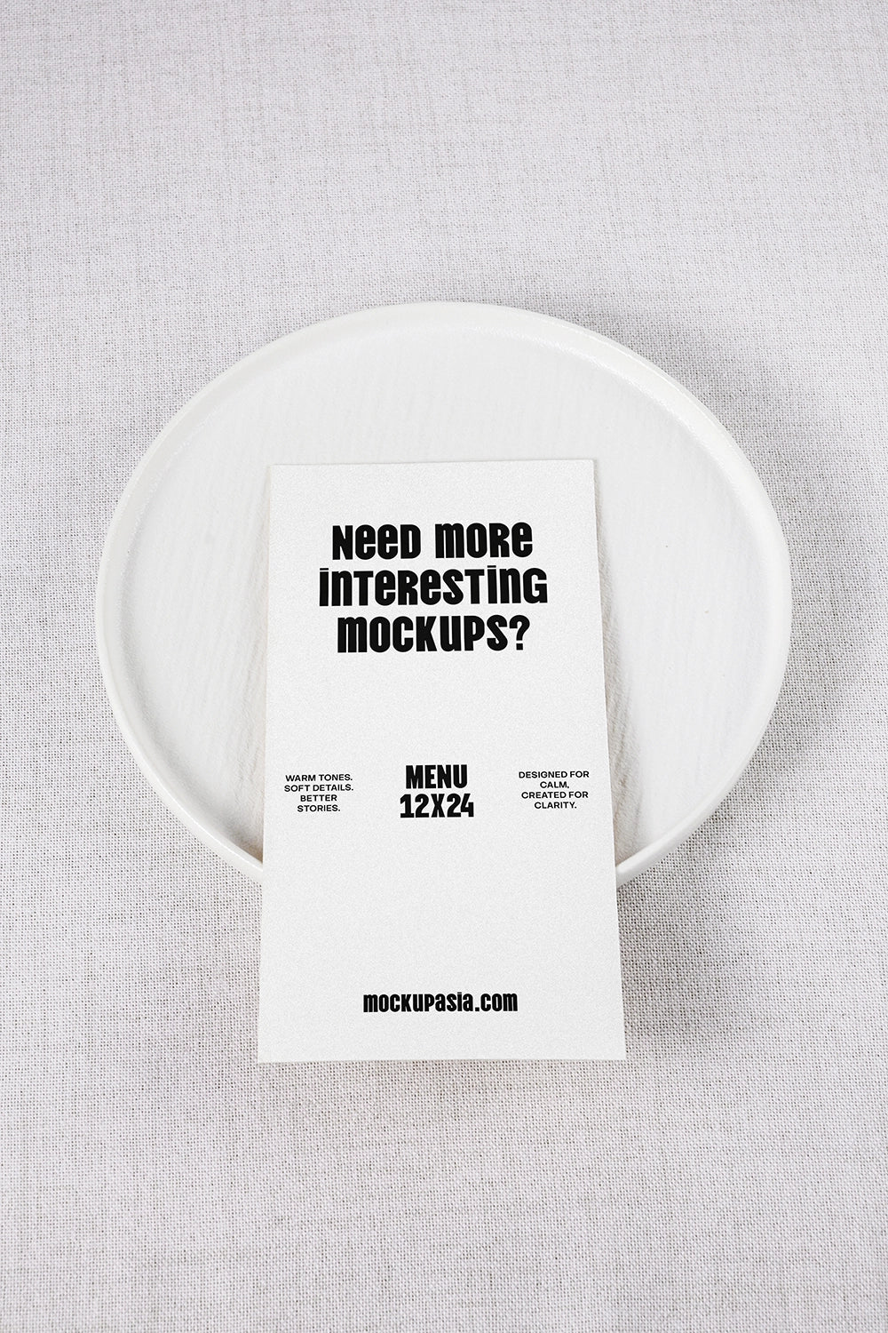 menu card mockup on ceramic plate with minimal table setting and top view