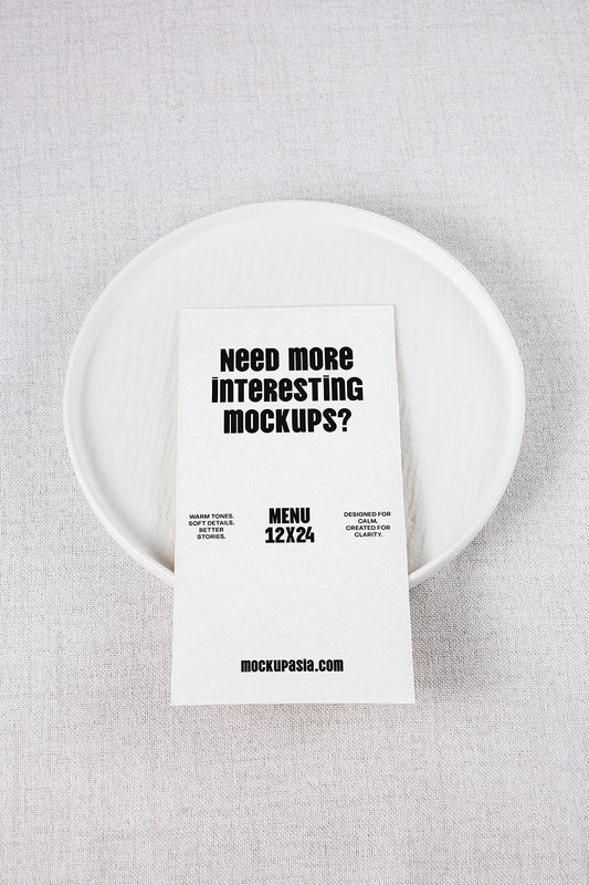 menu card mockup on ceramic plate with minimal table setting and top view