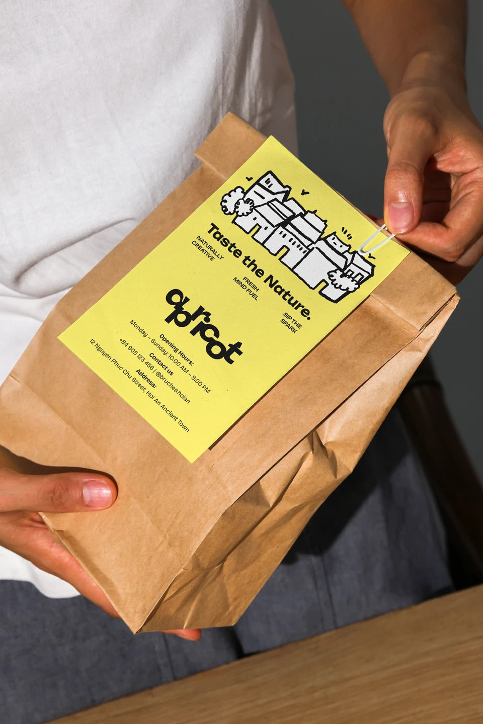 eco friendly kraft paper bag mockup with sticker label, sustainable packaging branding