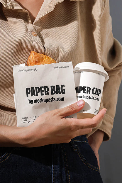 Mockup.Asia coffee bundle with paper cup and coffee bag on white background, ideal for showcasing coffee branding and packaging.