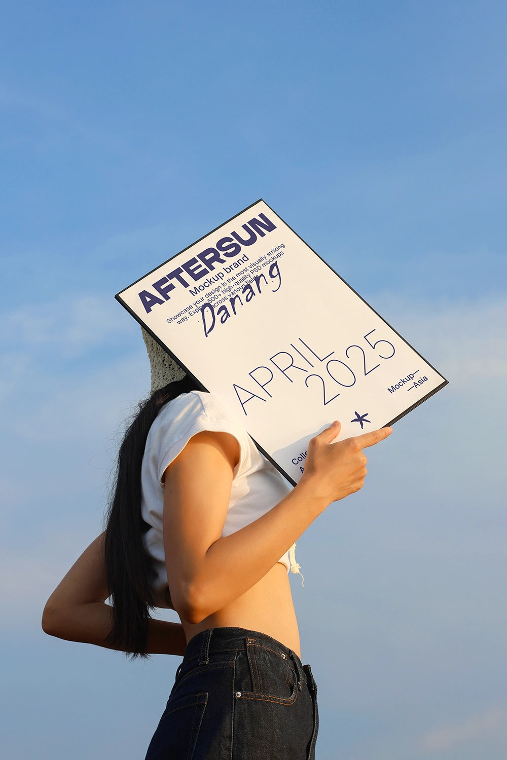 poster mockup held by model against blue sky with natural sunlight and realistic shadow