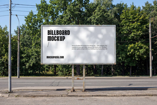 roadside billboard mockup with trees background and natural sunlight shadow patterns