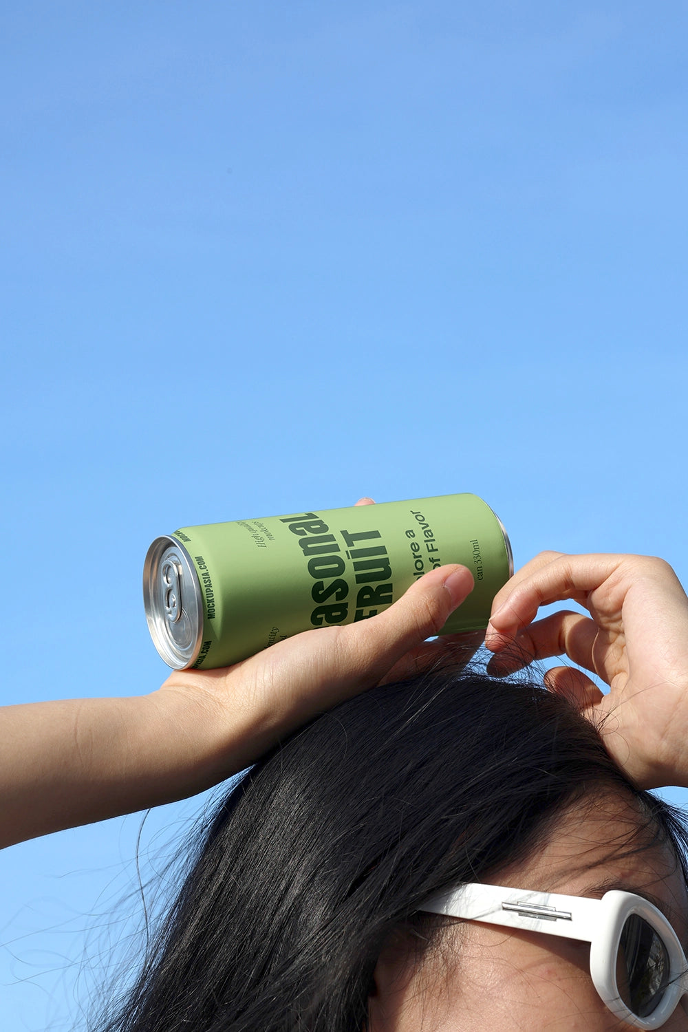 Creative soda can mockup with human interaction and natural lighting for modern beverage packaging presentation