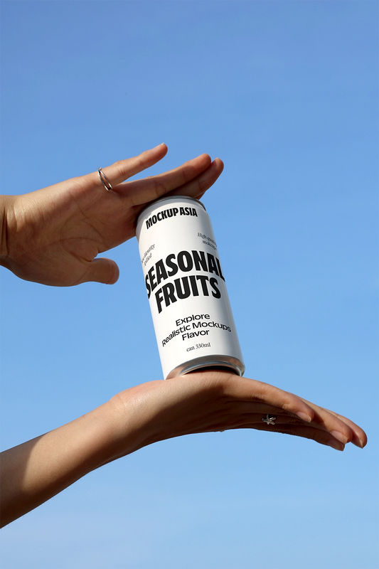Floating soda can mockup held by hands against blue sky background minimal beverage packaging