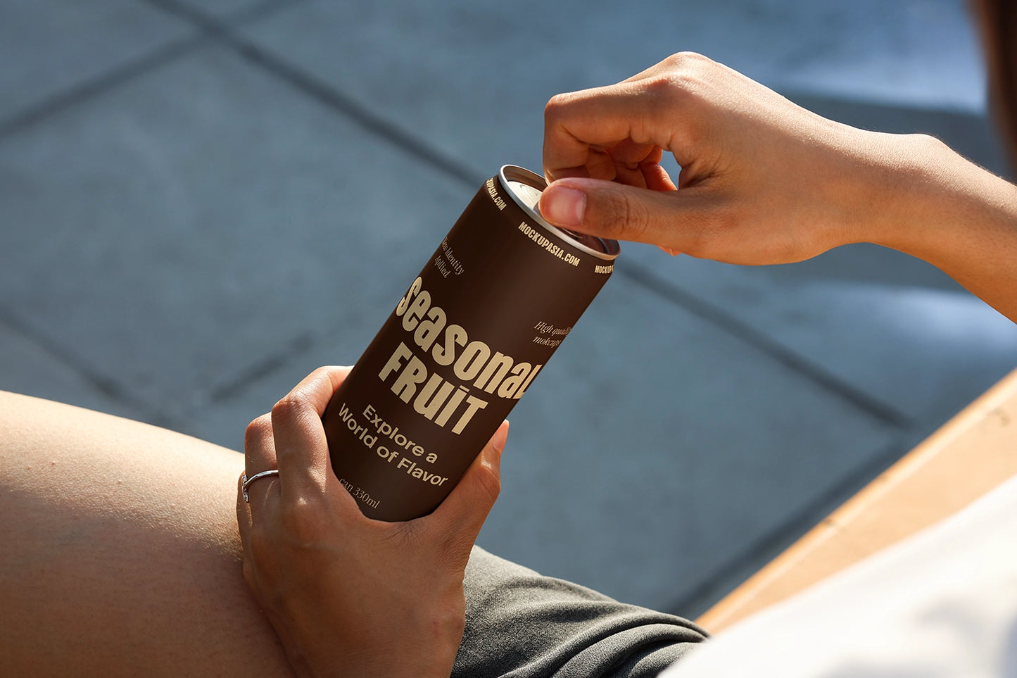 Close-up soda can mockup with interactive hand detail for modern beverage branding